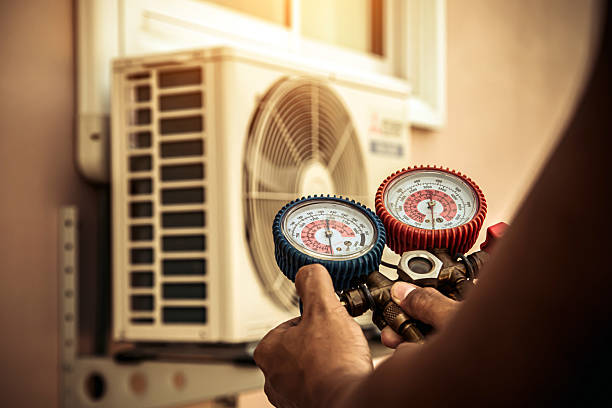 Professional Air Conditioning Service technician working in Savage, MN